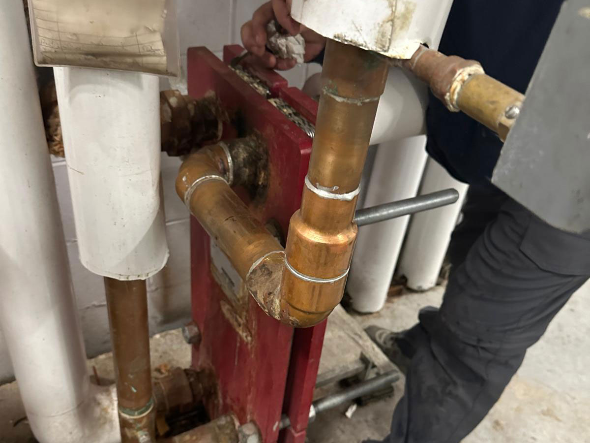 https://asnplumbing.ca/wp-content/uploads/2024/07/heat_exchangers.jpg